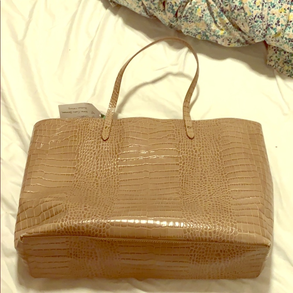 Barney’s snake skin bag